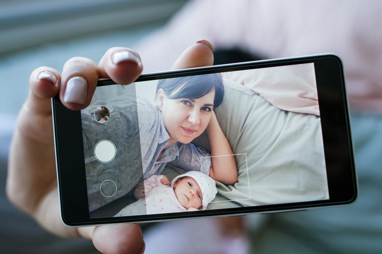 smartphone selfie family newborn mother