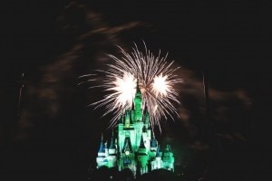 Walt Disney World castle at night with fireworks