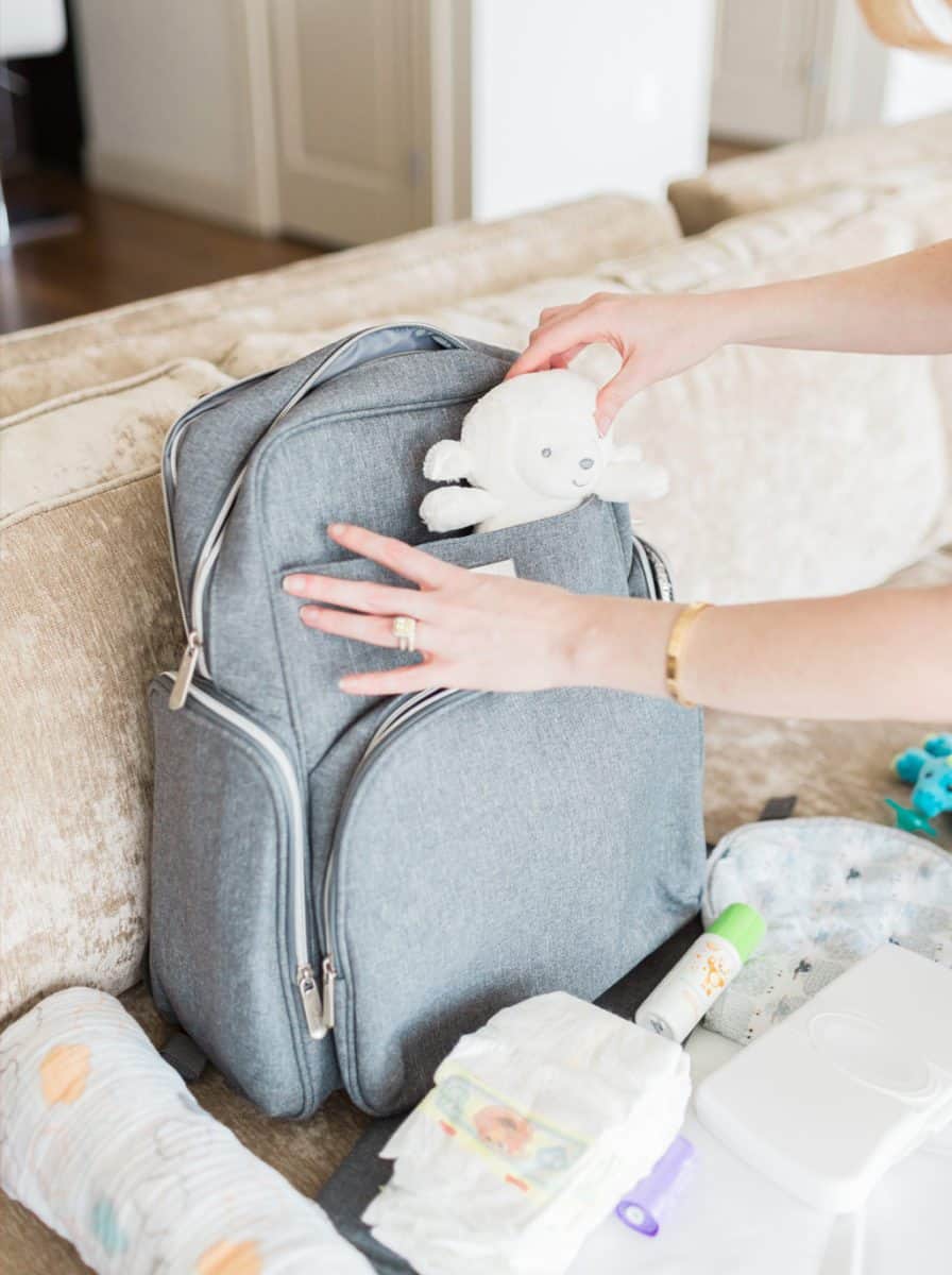 taking care of baby, helping mom out, diaper bag backpack