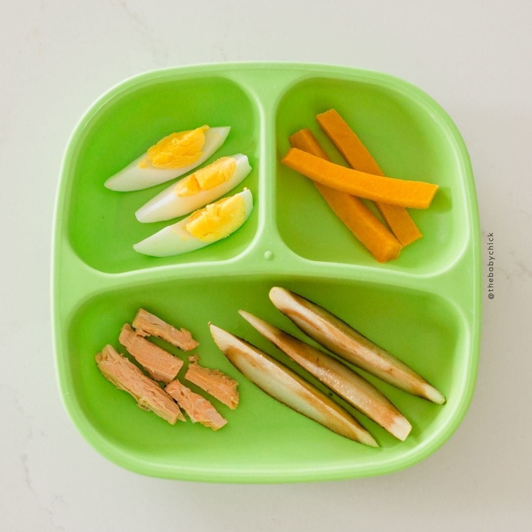 Toddler plate with vegetables and protein.