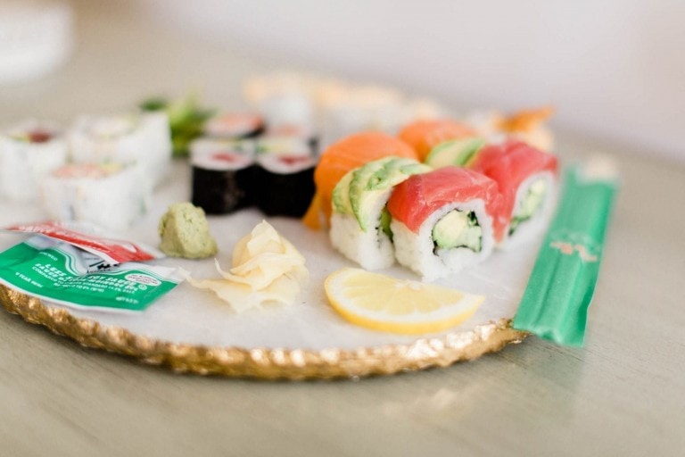 sushi rolls on a serving dish