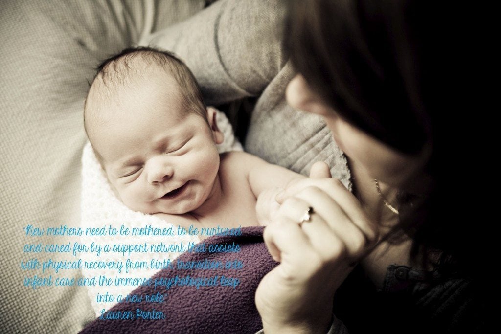 Smiling-newborn-in-mothers-arms-000015508096_Large