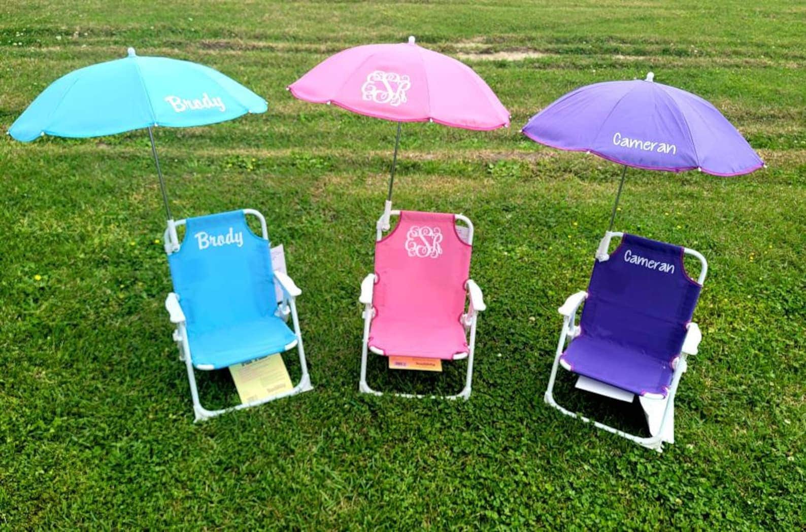 Personalized beach chairs with umbrella in purple, pink, and blue 