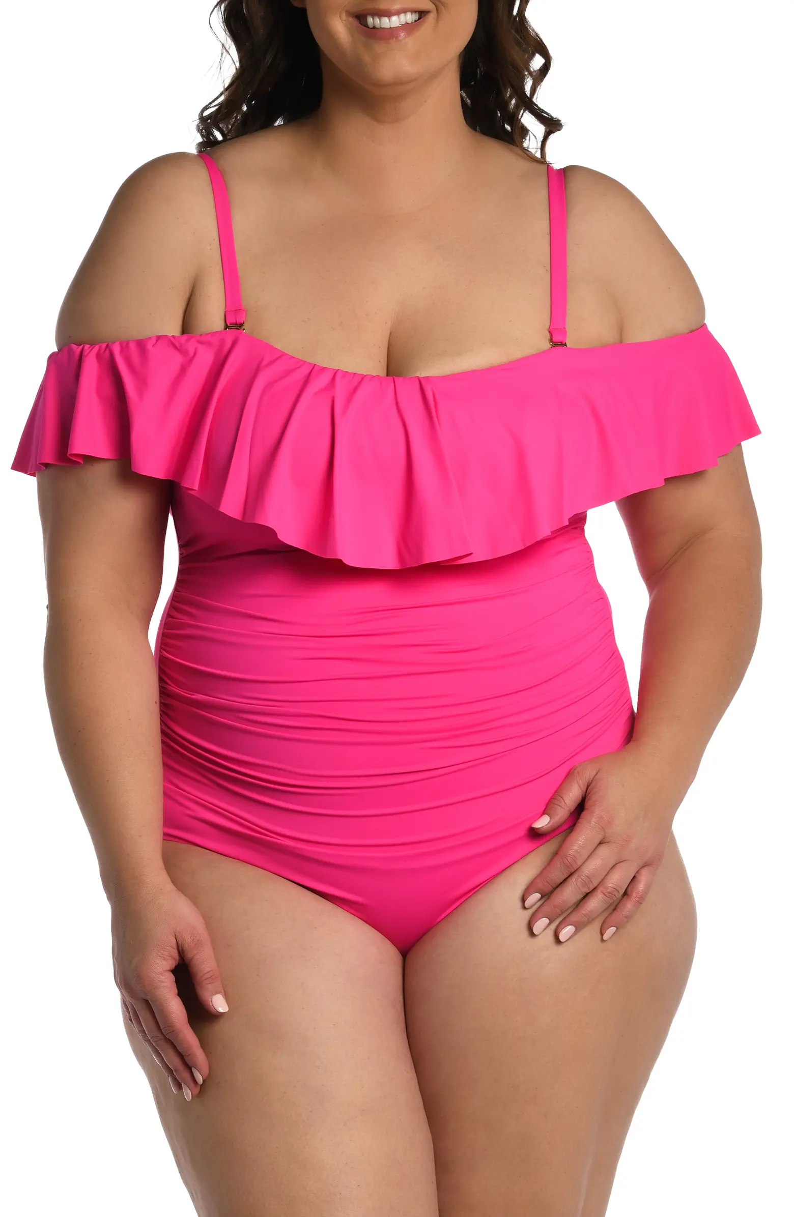 Woman in off the shoulder pink one-piece bathing suit 