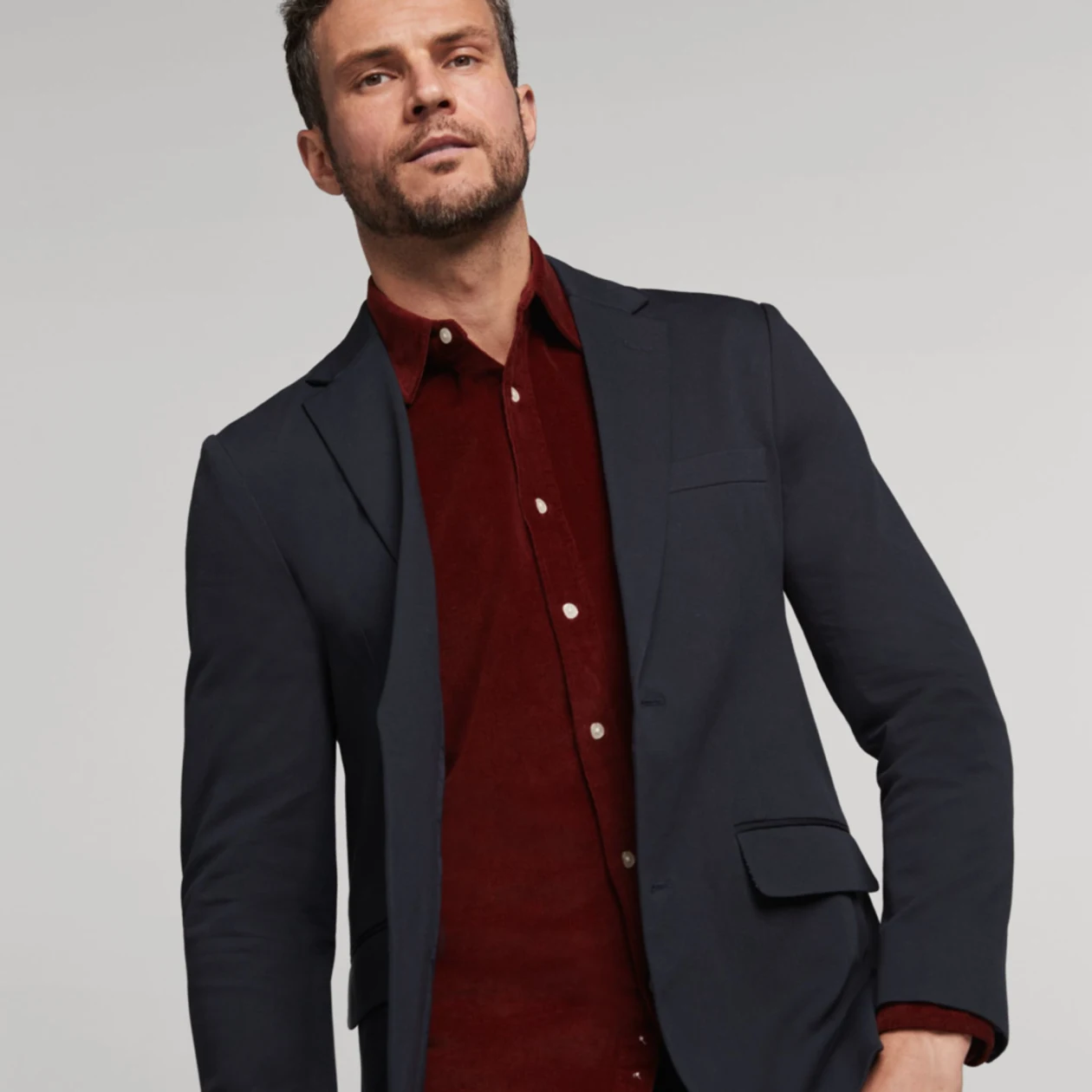 Man in red button-down shirt and black blazer from Stitch Fix 
