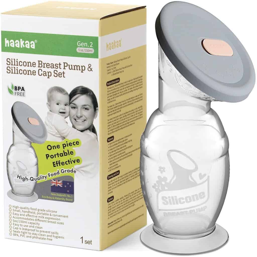 Image of a Haakaa Silicone Breast Pump & Silicone Cap Set. The packaging shows images of a woman holding a baby and the breast pump. Text on the box highlights it as "one piece, portable, effective" and details features like BPA free, high-quality food grade material. Ideal for postpartum recovery, the breast pump is shown beside the box.