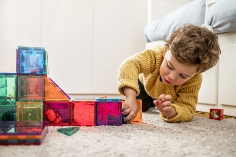 Boy playing with building Blocks.