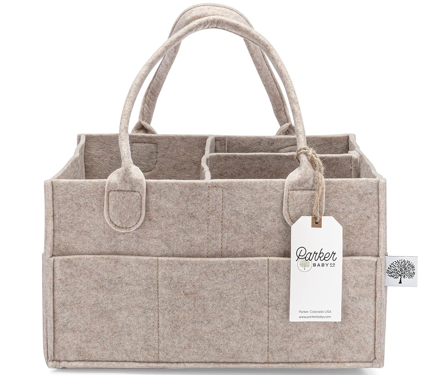 A beige felt diaper caddy, perfect for c-section recovery must-haves, features multiple compartments and two handles. A Parker Baby tag hangs from one handle, and the caddy appears empty with a tree logo decorating the side.