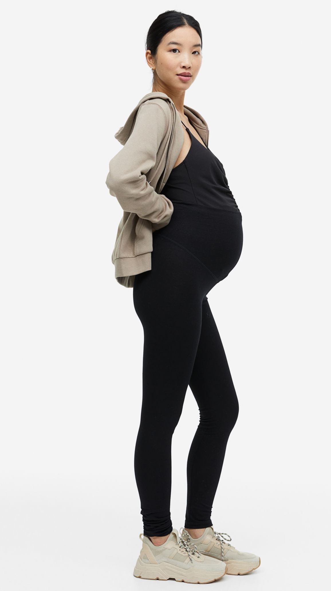 Woman in black maternity leggings 