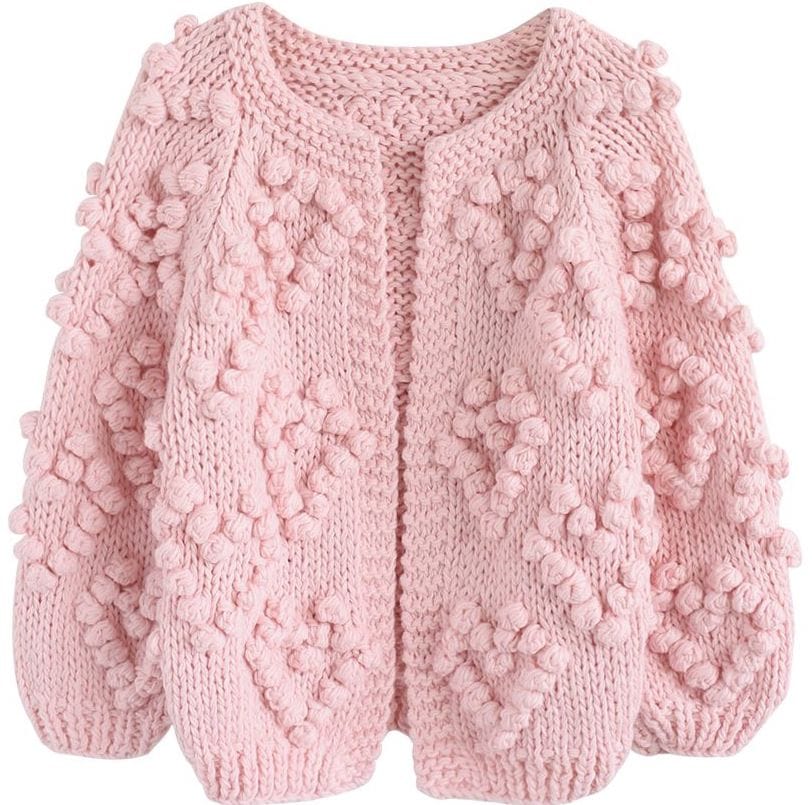 Pink cardigan sweater with hearts on it