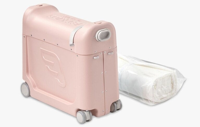 Pink rolling toddler bedbox for traveling