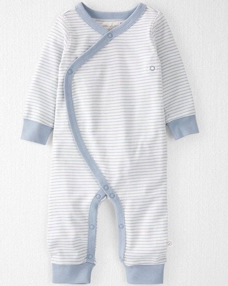 A baby onesie with a white and blue striped pattern, ideal for coming home outfits. It features long sleeves, light blue cuffs, and a diagonal snap button closure. The fabric appears soft and comfortable, perfect for infants.