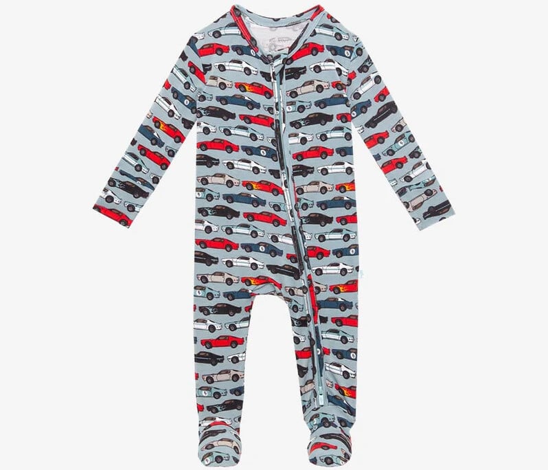 A delightful baby onesie perfect for coming home outfits, this piece features a pattern of colorful cars on a light gray background. It includes long sleeves, footed bottoms, and a convenient zipper down the front.