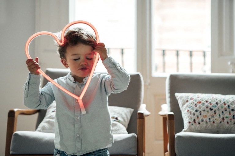 Boy posing with heart