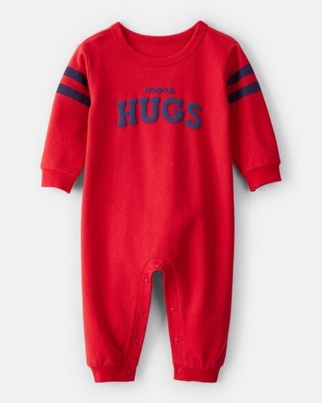 Red baby onesie with "more HUGS" text and navy stripes, perfect for Valentine's Day.