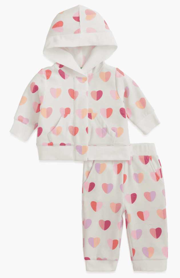 Baby Valentine's Day outfit with heart print hoodie and pants.