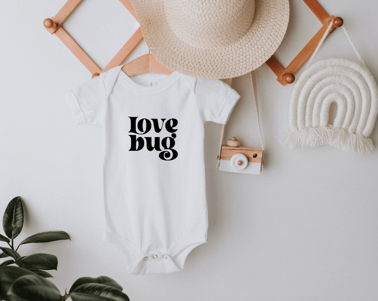 Love bug onesie in white and black 