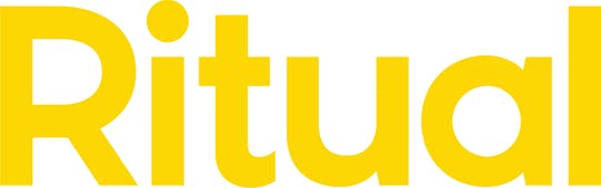 The image displays the word "Ritual" written in bold, yellow text against a white background, reminiscent of their postnatal multivitamins packaging.
