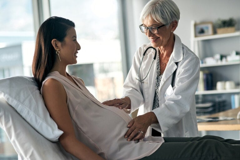 Cropped shot of a pregnant woman having a consultation with a female doctor
