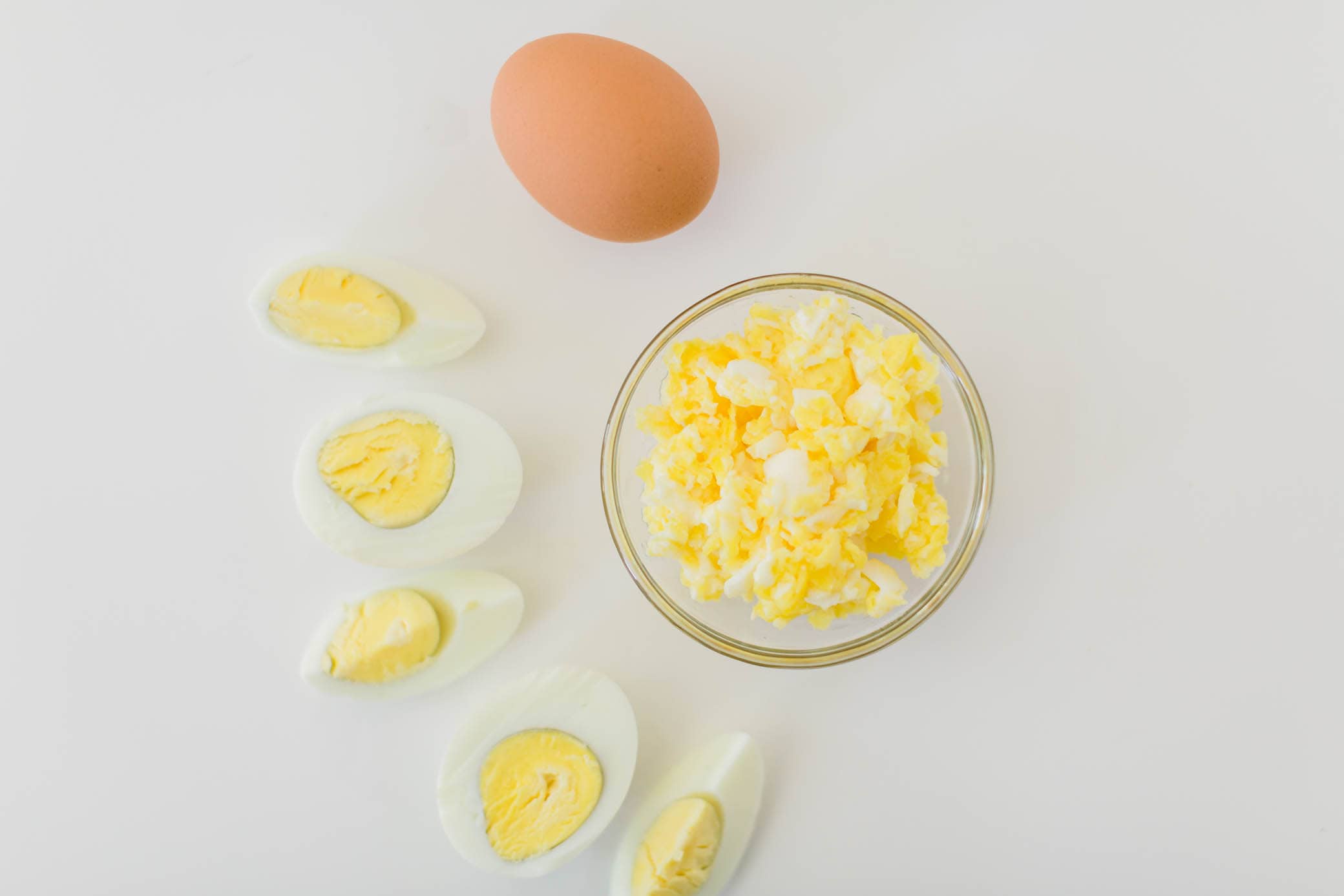 Eggs shown different ways to prepare to give to a baby.
