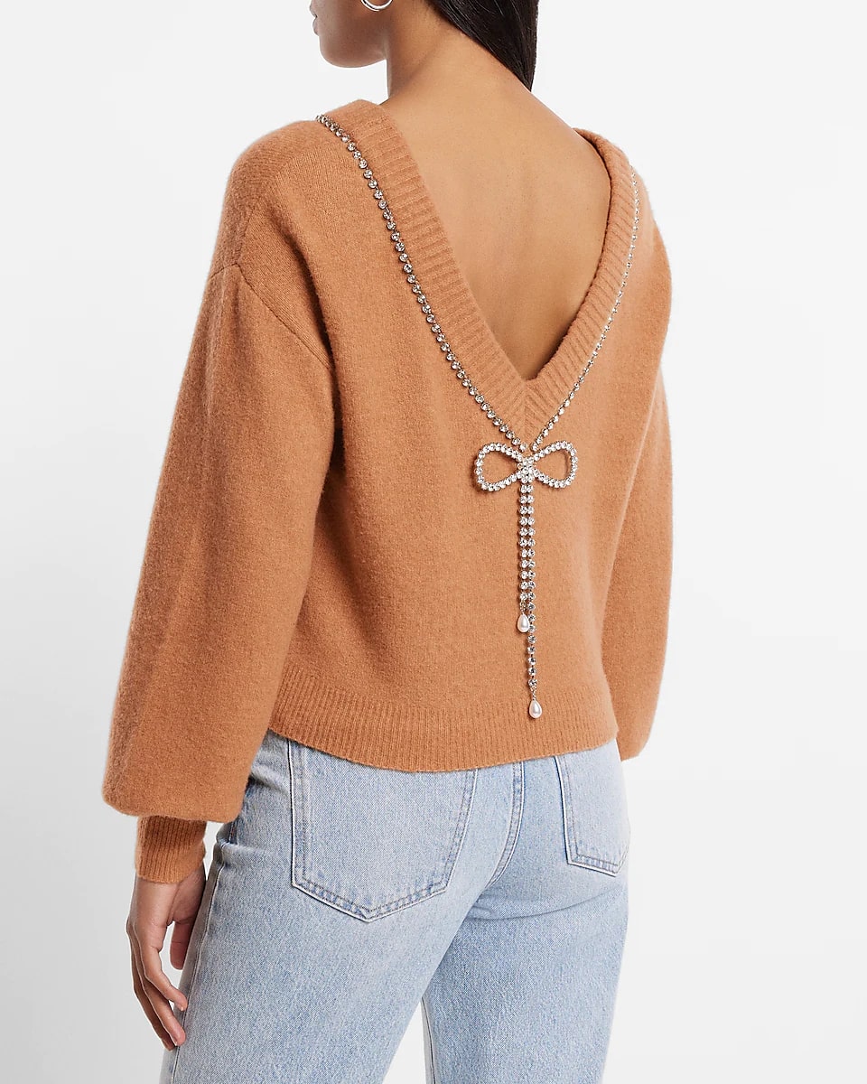 Tan sweater with crystal bow detail 