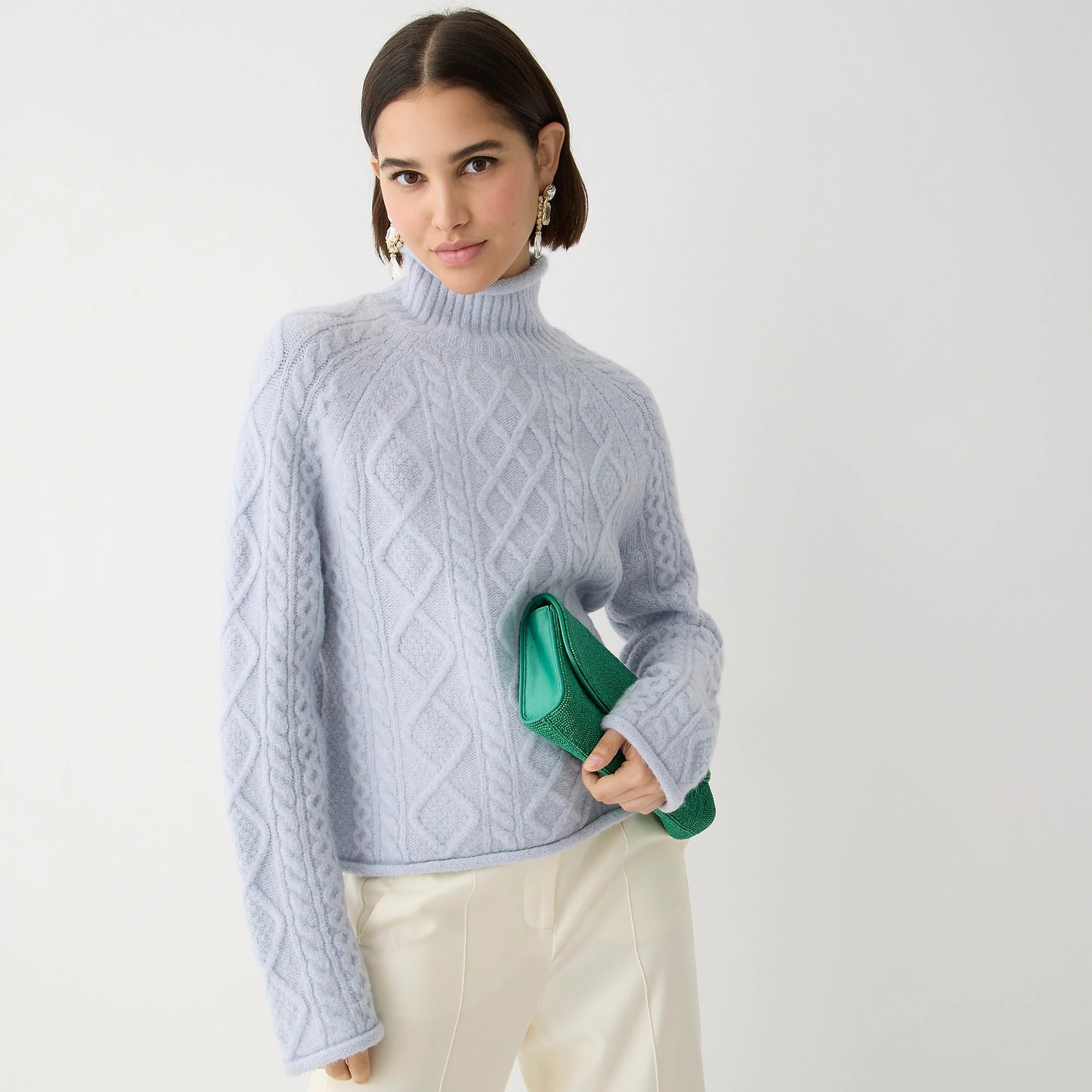 Woman in blue sweater from J. Crew