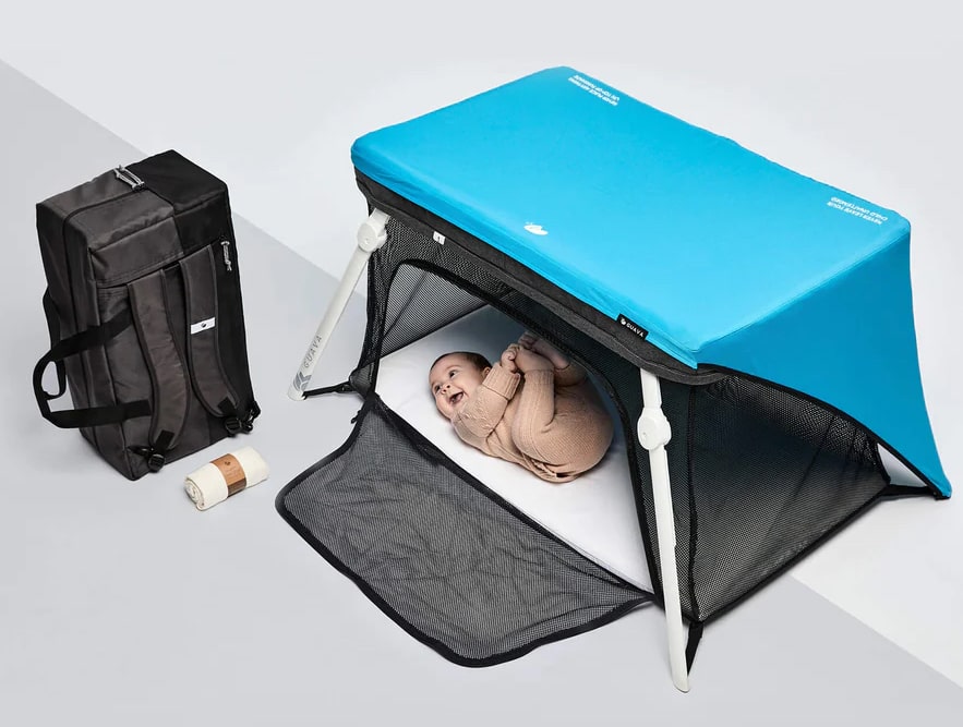 Travel crib with back back, fitted sheet, and sun shade in blue 