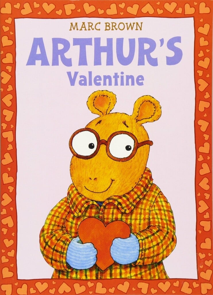 Arthur holding a heart