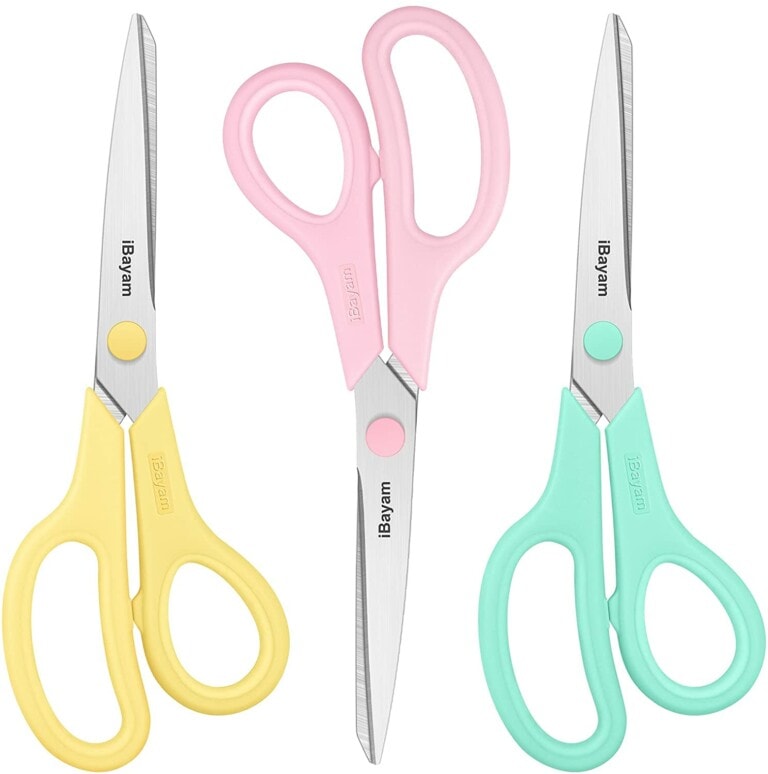 Yellow, pink, and blue scissors