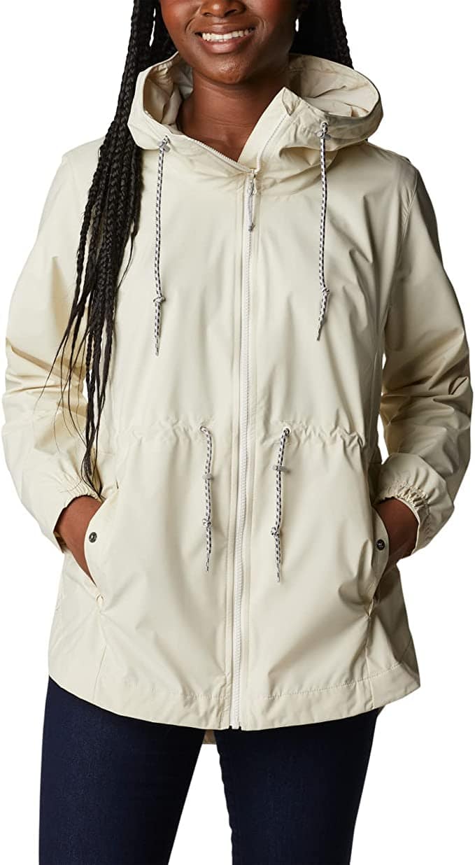 Woman in cream rain jacket