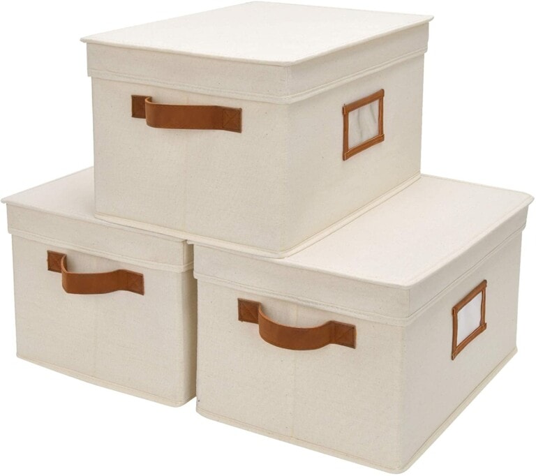 White storage bins with brown handles