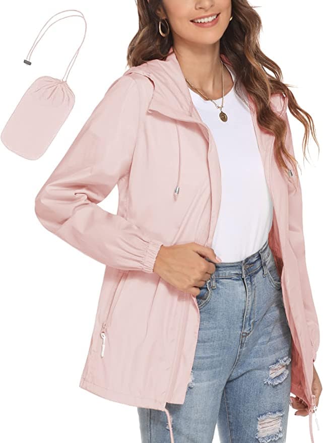 Woman in light pink rain jacket