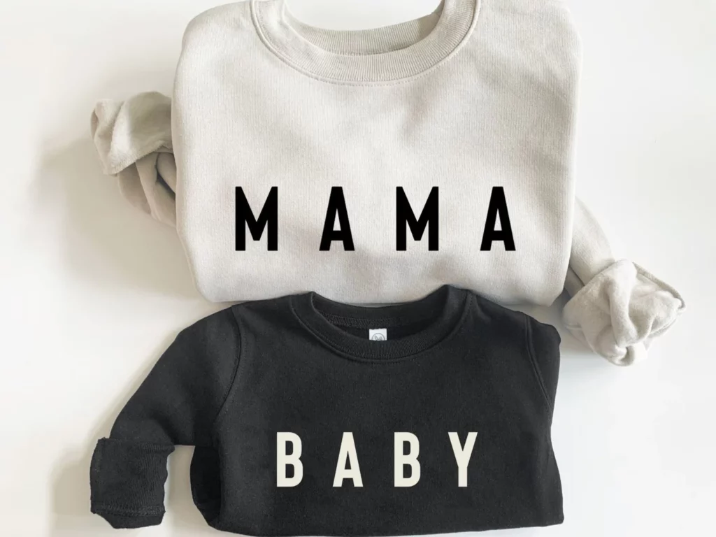 mama and baby matching black and white sweatshirts