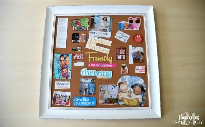 Family vision board on a framed cork board.