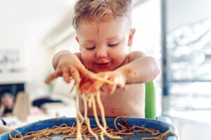 Baby Boy Eating Spaghetti with his hands