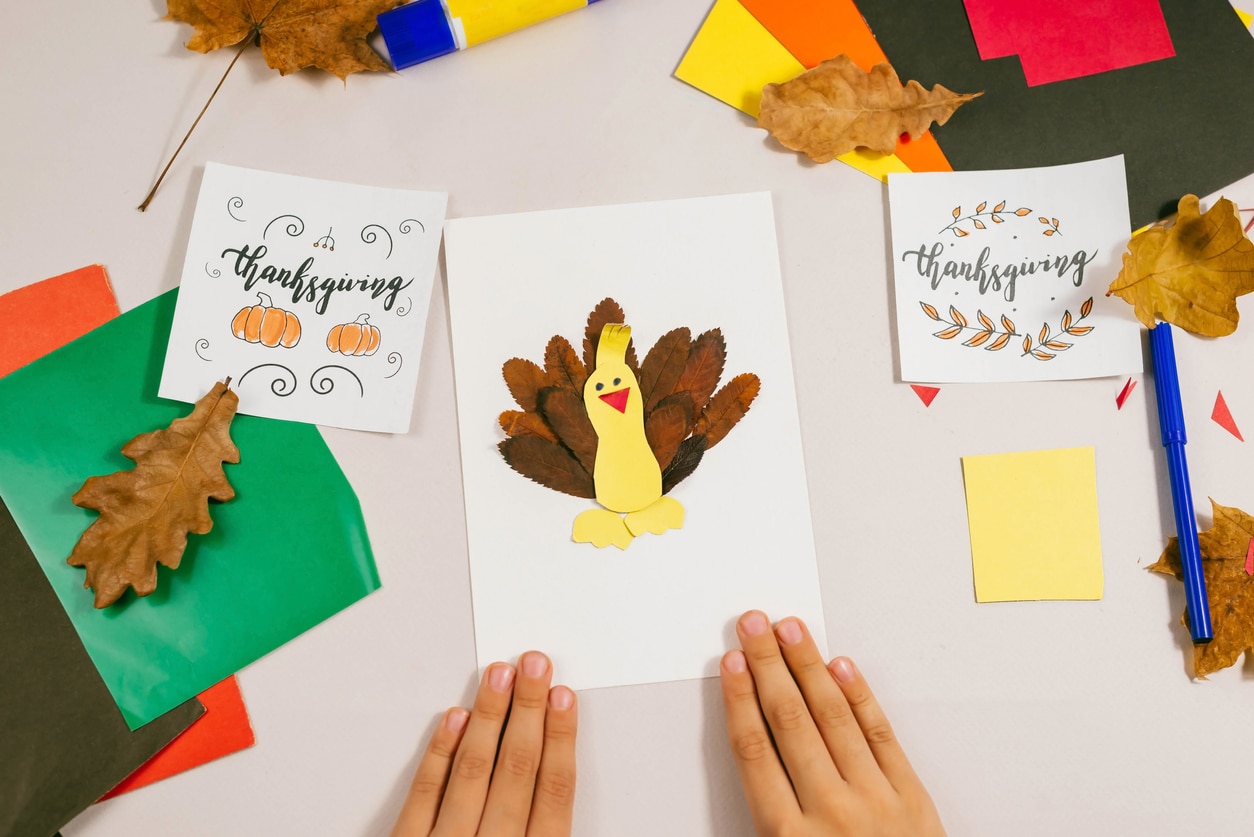 https://www.baby-chick.com/wp-content/uploads/2022/10/Cute-turkey-made-of-colored-paper-and-dry-mountain-ash-leaves-for-Thanksgiving.-Traditions-holidays-concept.-1347704951_1256x838.jpeg