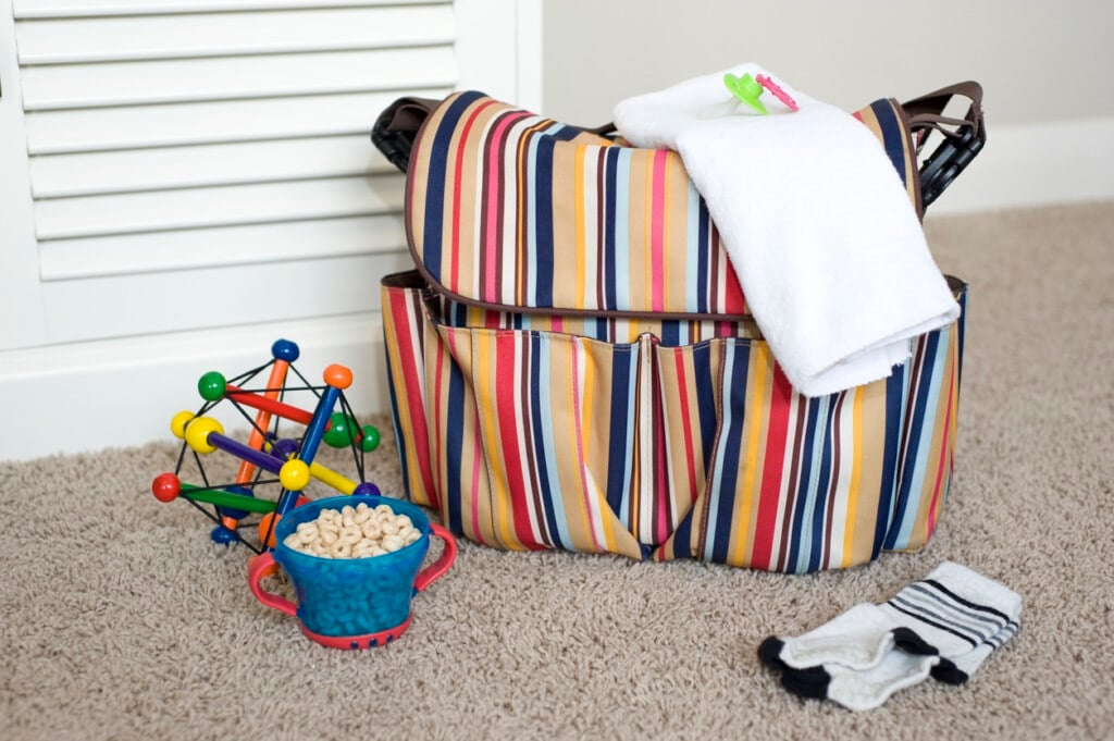 Essential items for baby and toddler, along with a diaper bag to pack them in.