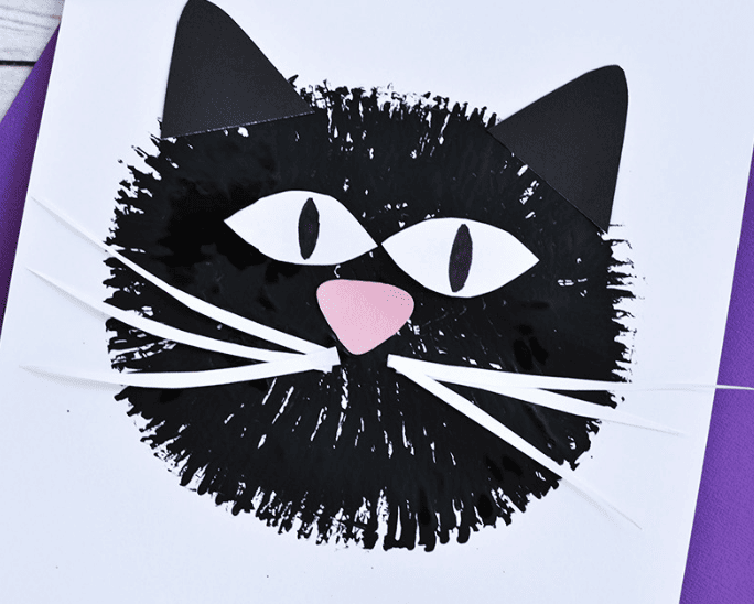 Fork-painted black cat craft for kids