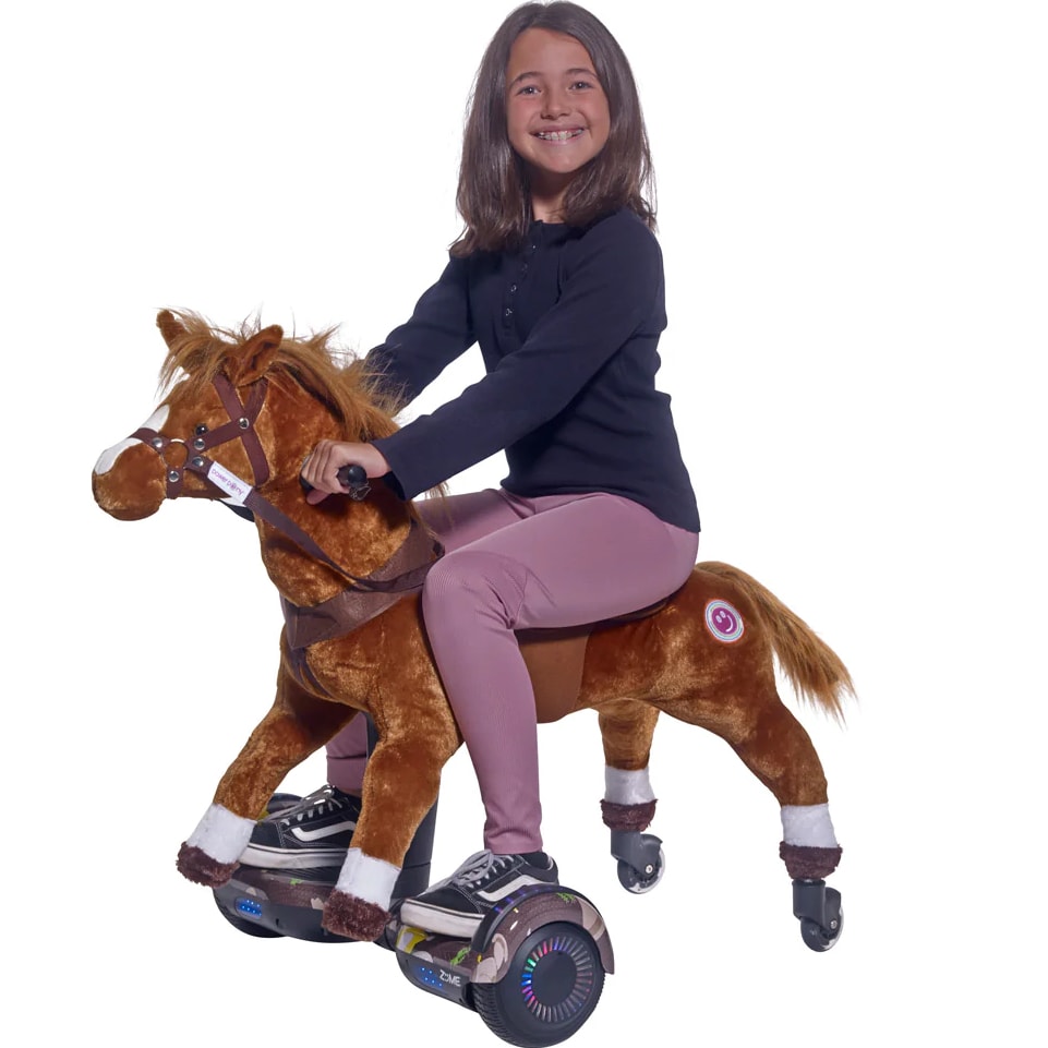 Girl riding toy pony 