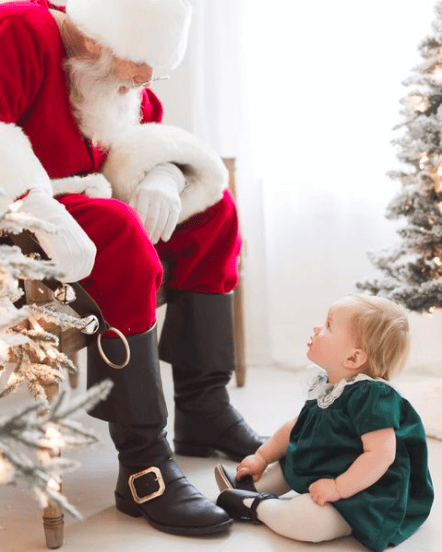 baby girl meeting santa