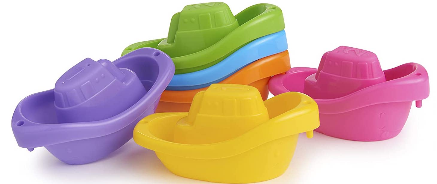 A set of six toy boats in yellow, purple, pink, orange, green, and blue. 