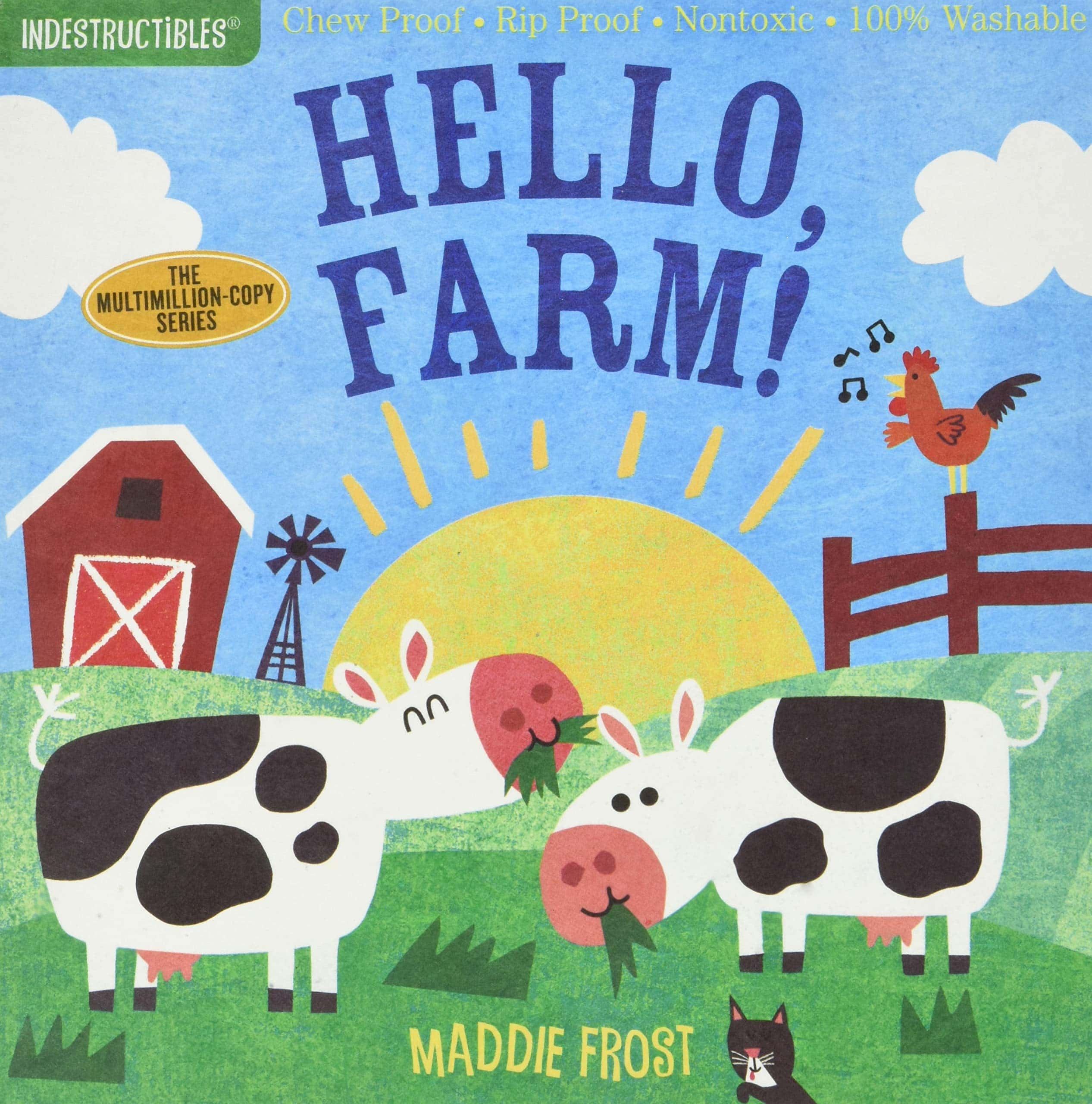 A book with a barn and two cows eating grass on the front with a singing chicken. 