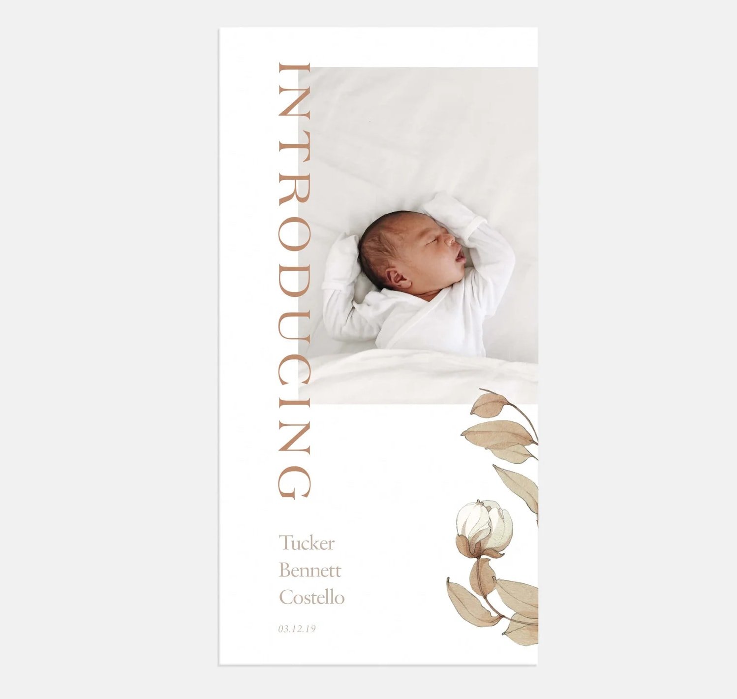 White card with image of a baby accented by a floral design. There is also text annoucing the birth of the baby. 