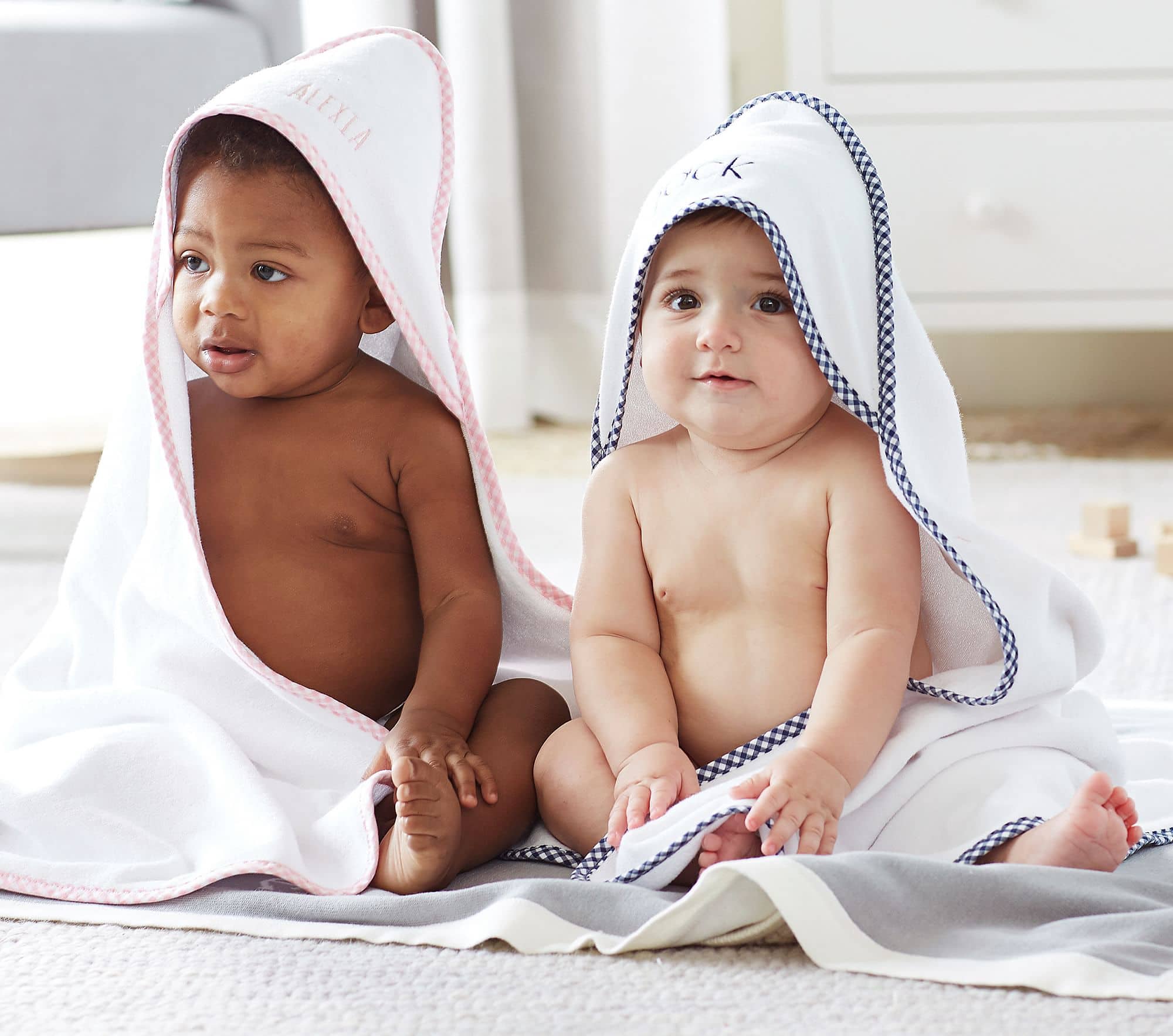 Babies in personalized hooded towels 
