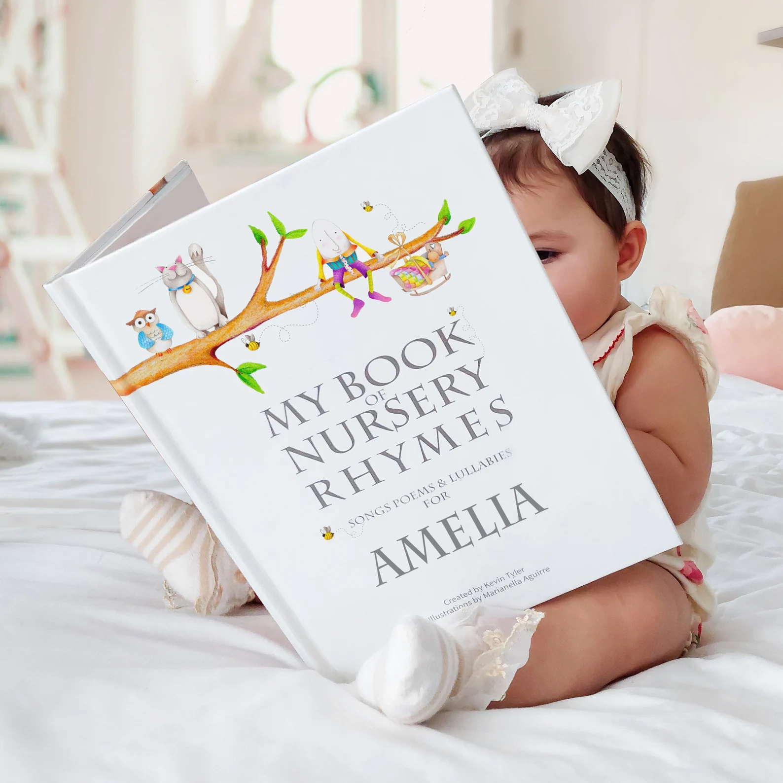 Baby reading personalized book 
