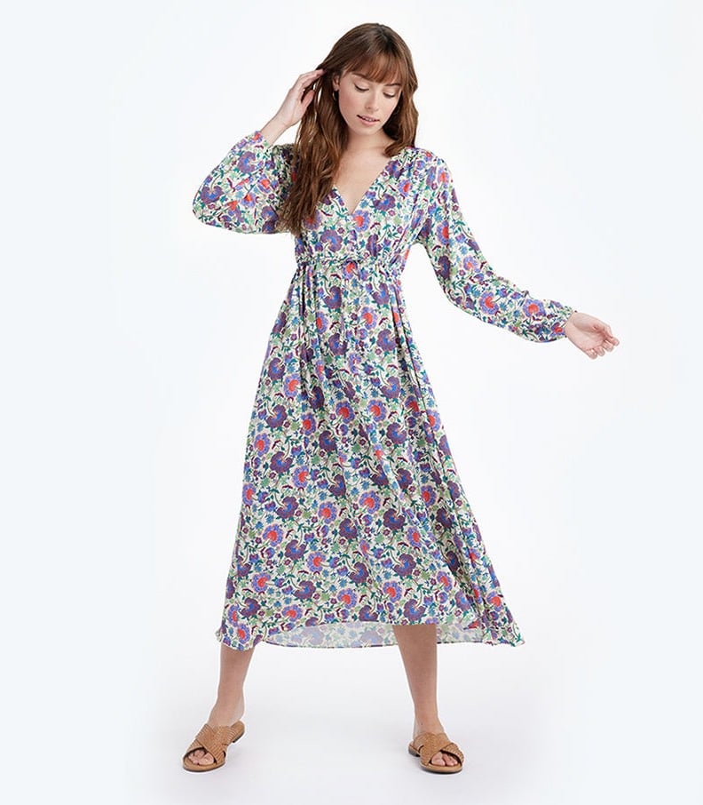Woman in floral wrap dress with long-sleeves 