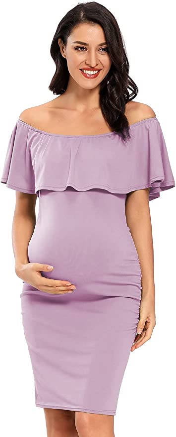 Woman in purple off the shoulder maternity dress 