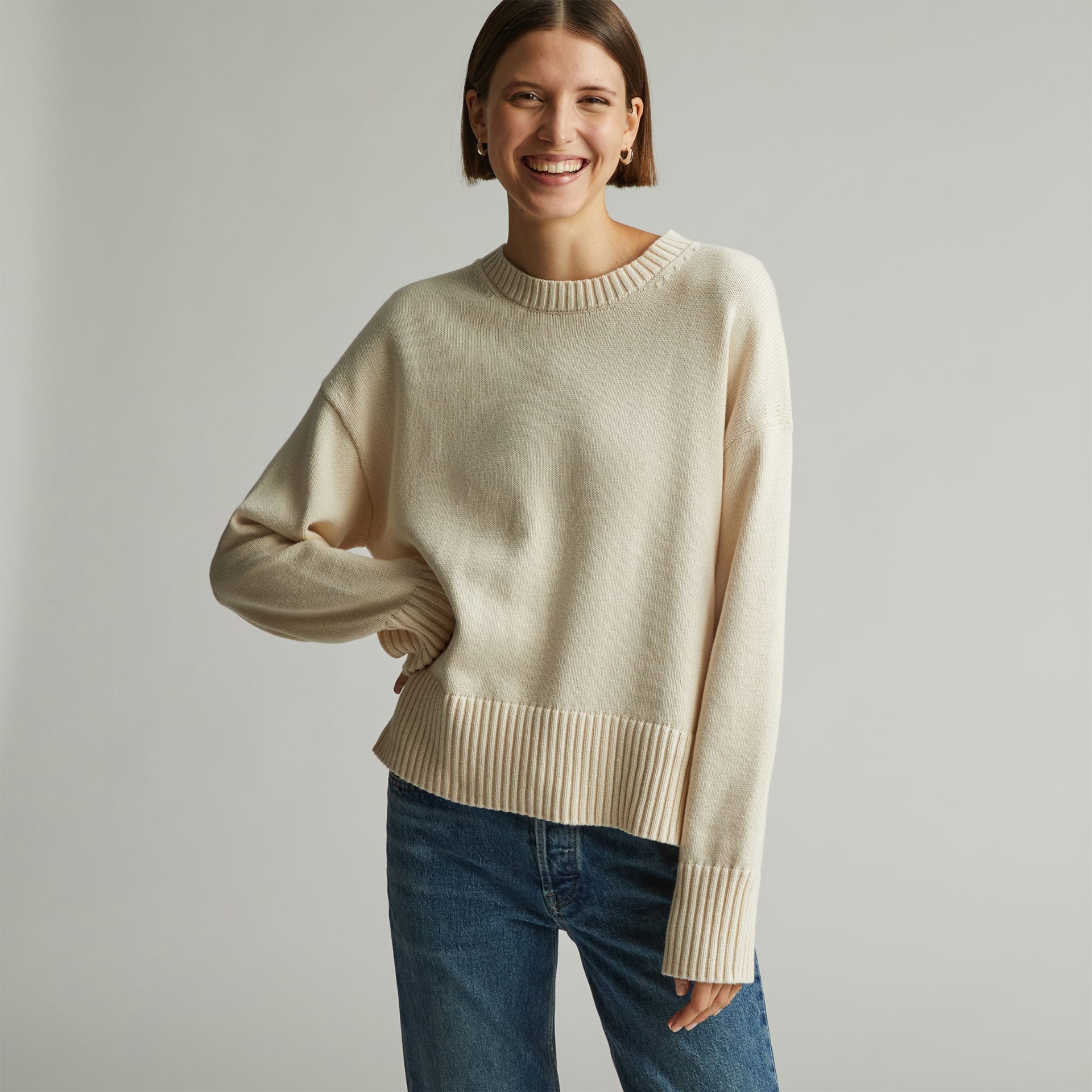 Woman in cream sweater 