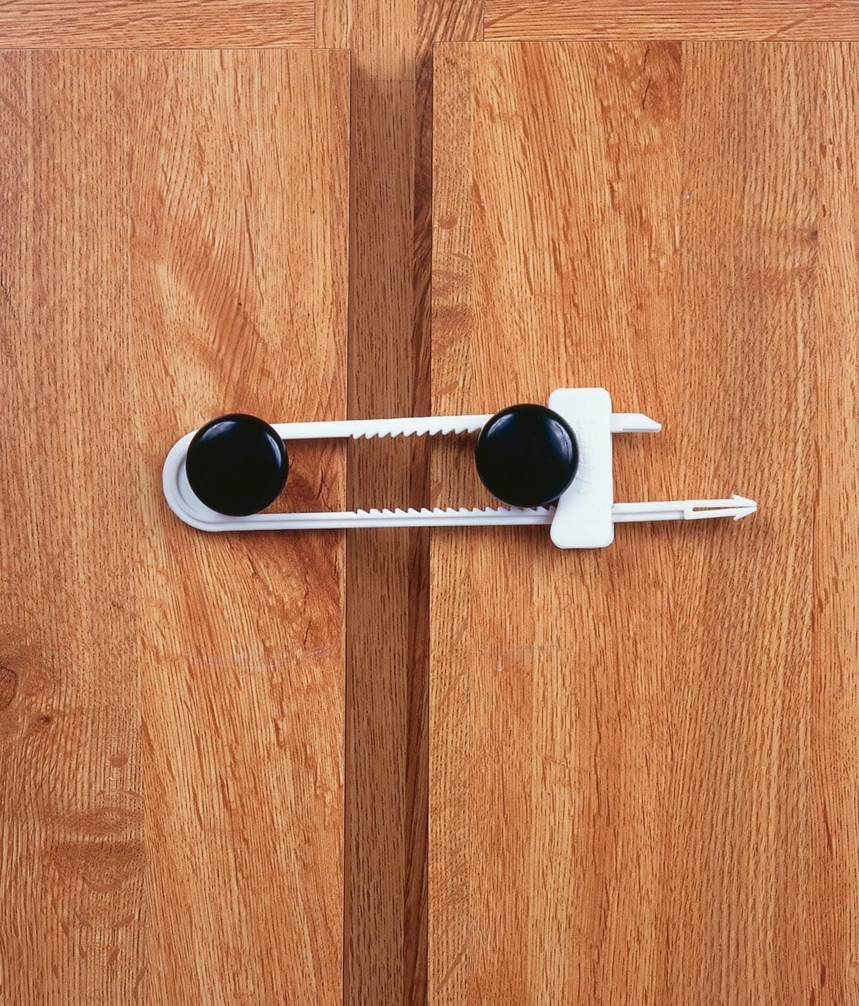 Cabinet slide lock 