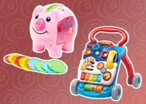 Piggy bank toy and baby walker over maroon design background